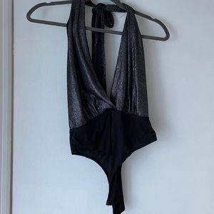 Open back body suit.